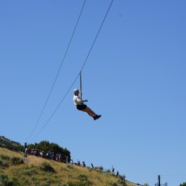swinging down the zipeline course in Lava Hot Springs