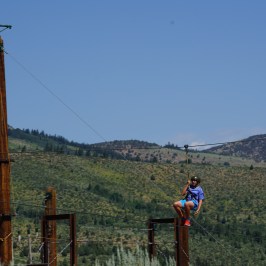 Ziplining through the adventure course in Idaho