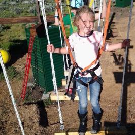 Kids enjoying the ropes course in Lava Hot Springs