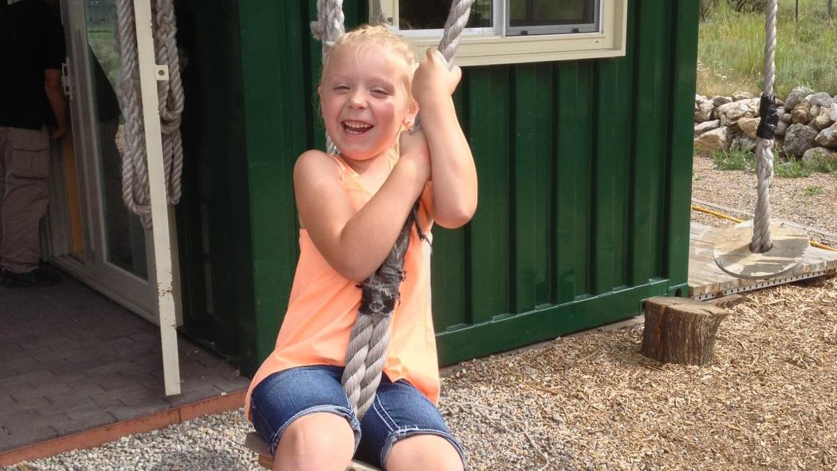 Girl enjoying the ropes course
