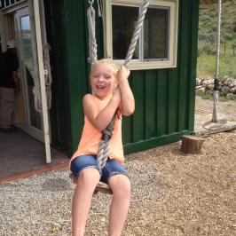 Girl enjoying the ropes course