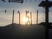 sunset silhouette of high ropes adventure course - lava hot springs idaho
